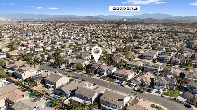 drone / aerial view featuring a mountain view