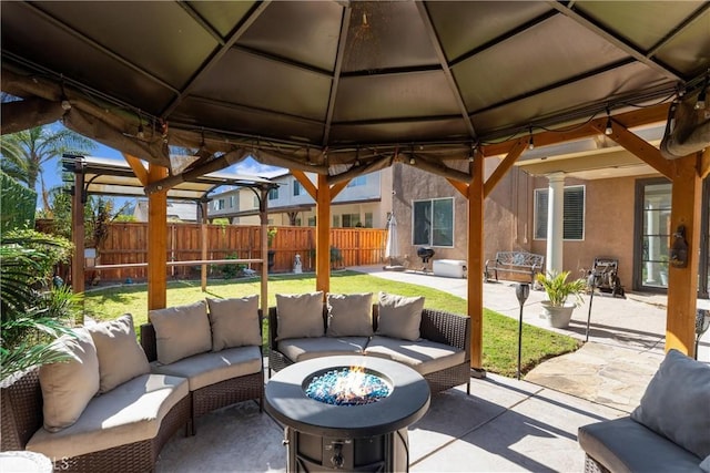 view of patio with a gazebo and outdoor lounge area