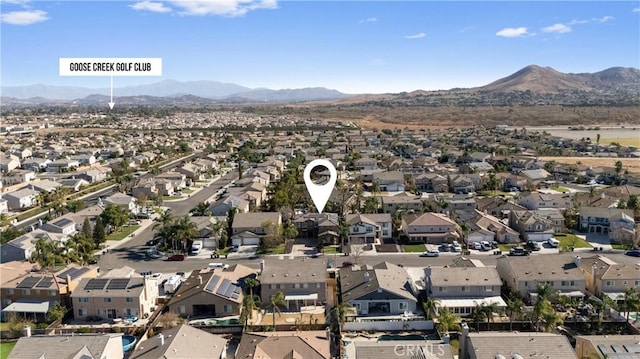 drone / aerial view featuring a mountain view