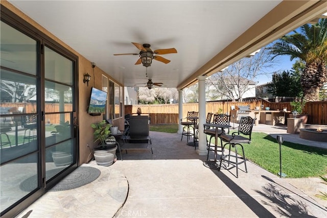 view of patio featuring ceiling fan and area for grilling