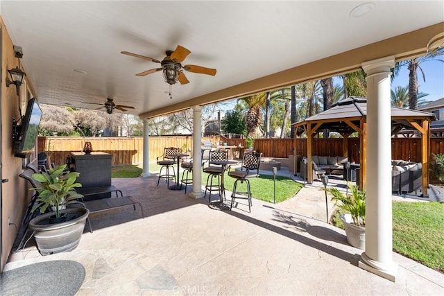 view of patio / terrace with ceiling fan, outdoor lounge area, and a gazebo