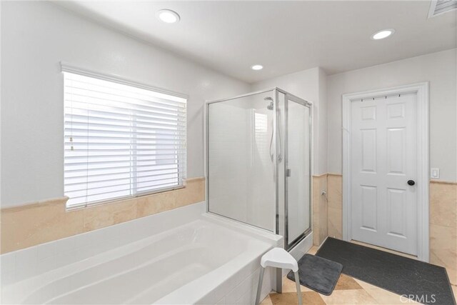 bathroom with independent shower and bath