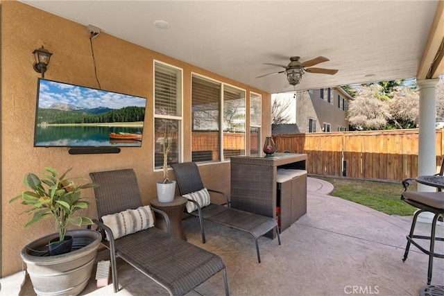 view of patio with ceiling fan