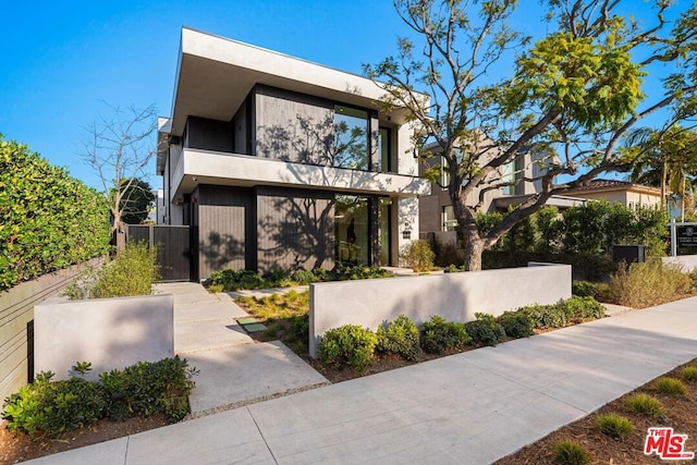 contemporary house featuring a balcony