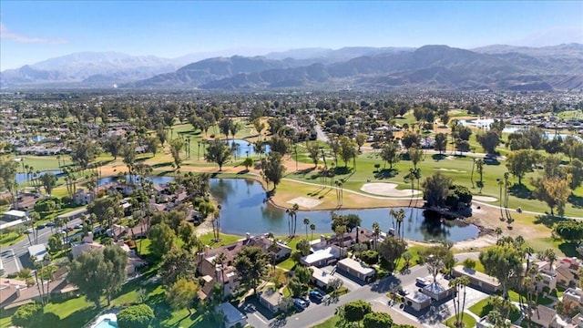 bird's eye view with a water and mountain view