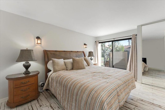 bedroom with light hardwood / wood-style floors