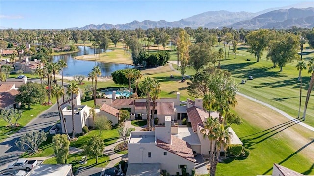 bird's eye view with a water and mountain view