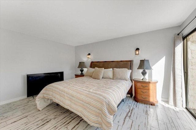 bedroom with light hardwood / wood-style floors