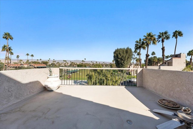 view of patio / terrace with a balcony