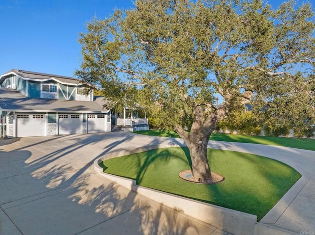 1404 E Mission Rd, Fallbrook, CA 92028 - view of front of home with concrete driveway, an attached garage, and a front lawn