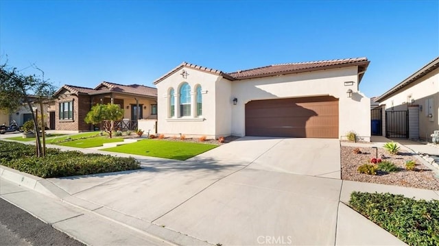 mediterranean / spanish house featuring a garage