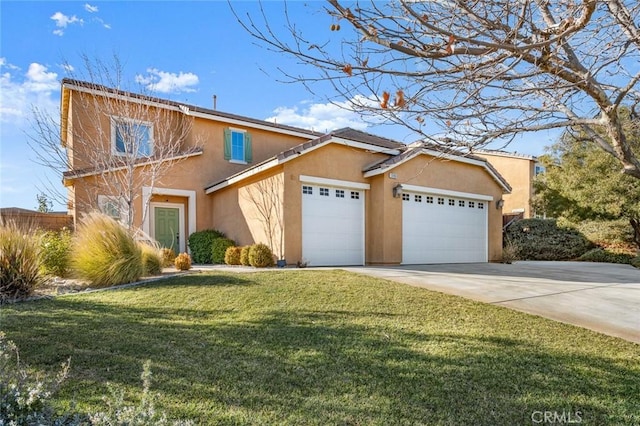 view of front property featuring a front yard and a garage