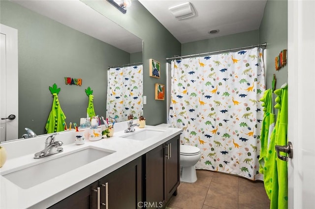 bathroom with toilet, a shower with shower curtain, tile patterned flooring, and vanity