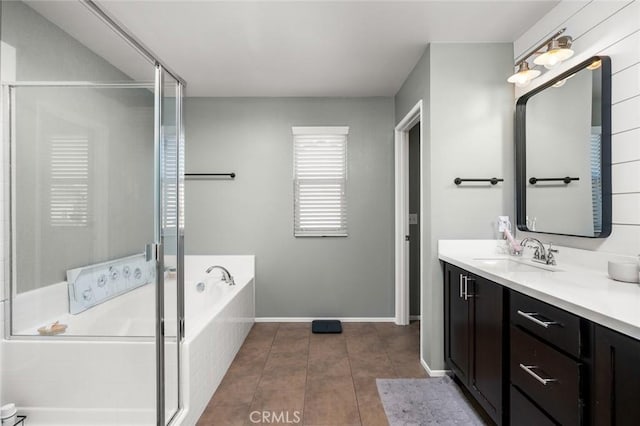 bathroom featuring vanity, tile patterned flooring, and independent shower and bath