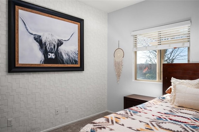 bedroom featuring dark colored carpet