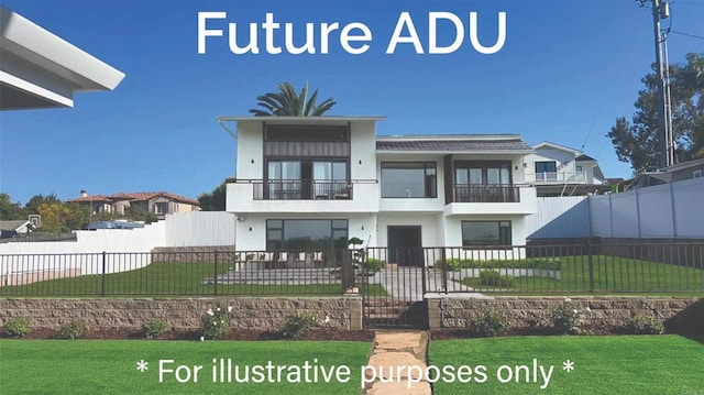 view of front of home with a front yard and a balcony