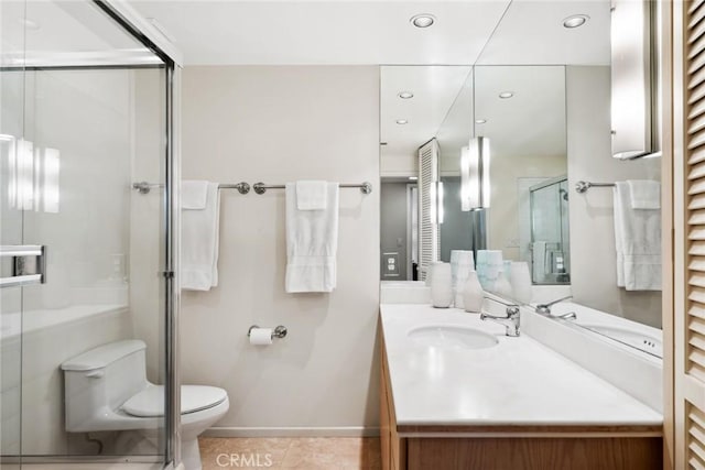 full bathroom featuring recessed lighting, toilet, a stall shower, vanity, and tile patterned flooring