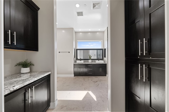 hallway featuring sink