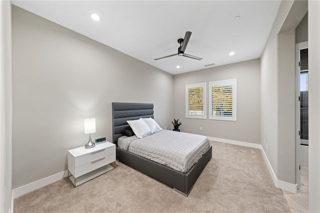 carpeted bedroom featuring ceiling fan