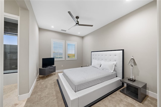 carpeted bedroom featuring ceiling fan