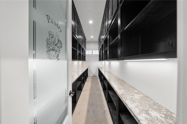 kitchen featuring light stone countertops