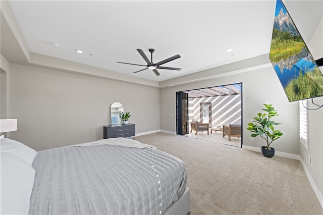 carpeted bedroom featuring ceiling fan