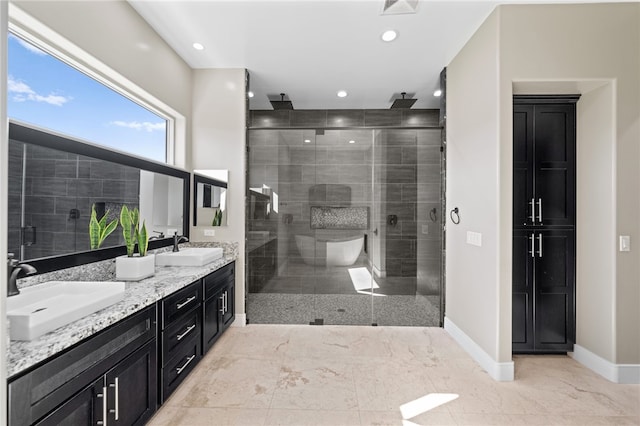 bathroom with vanity and an enclosed shower