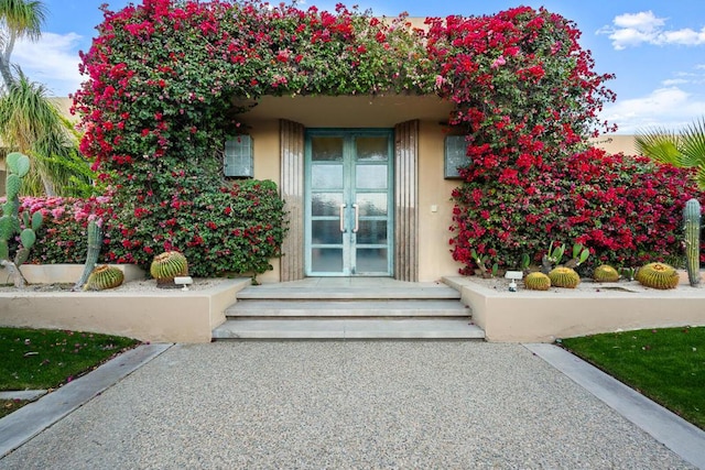 view of exterior entry with french doors