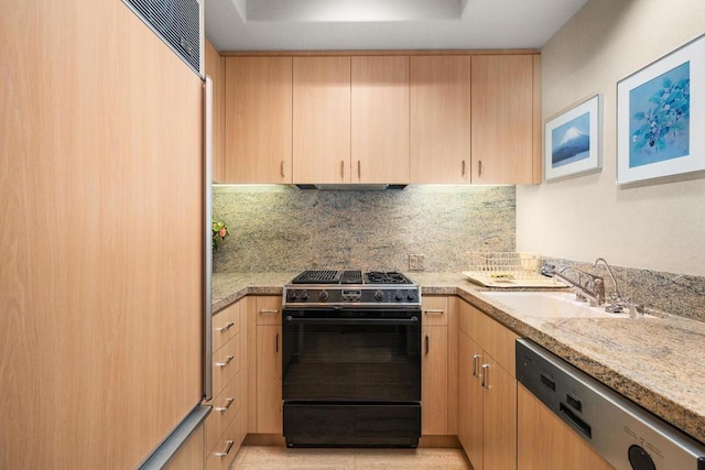 kitchen featuring light brown cabinetry, black gas range oven, dishwasher, and sink