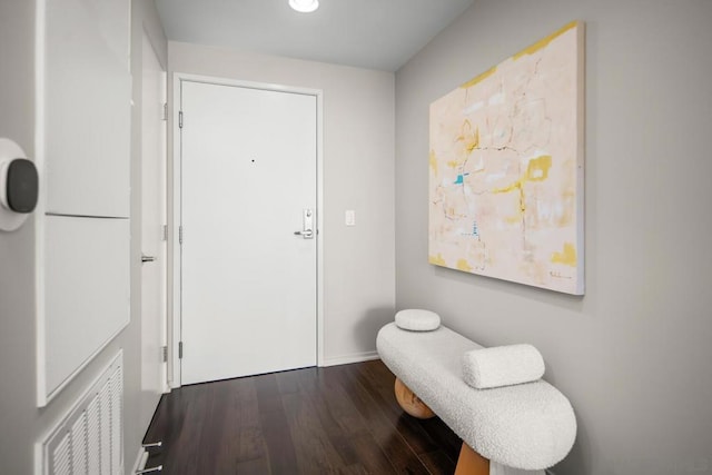 entrance foyer with dark hardwood / wood-style floors