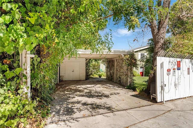 view of patio / terrace featuring a carport