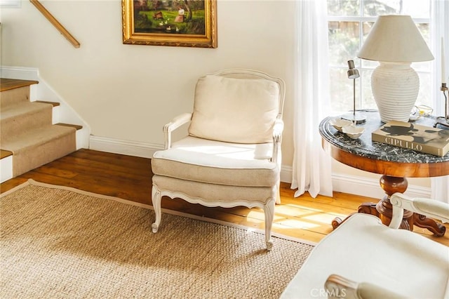 living area with wood-type flooring