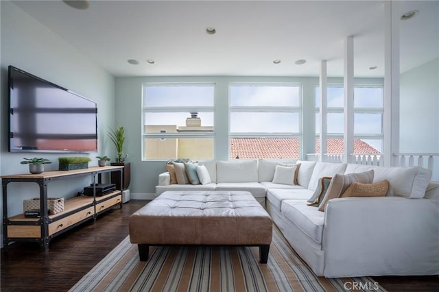 living room with dark hardwood / wood-style floors