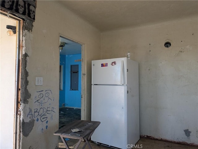 kitchen featuring white fridge