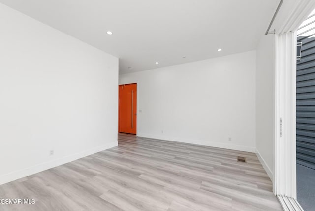 empty room featuring light hardwood / wood-style flooring