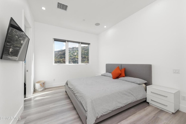 bedroom featuring light hardwood / wood-style floors