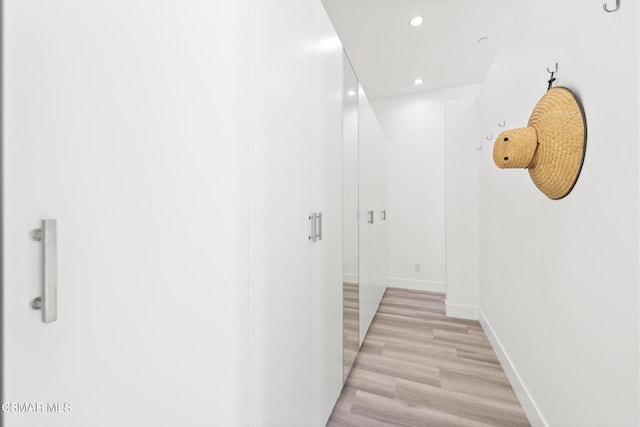 hallway featuring light hardwood / wood-style floors