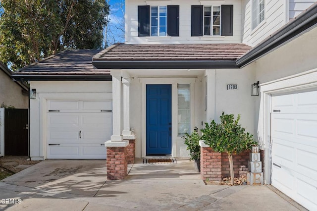 entrance to property featuring a garage