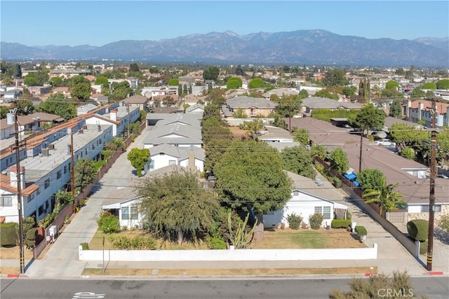 drone / aerial view featuring a mountain view