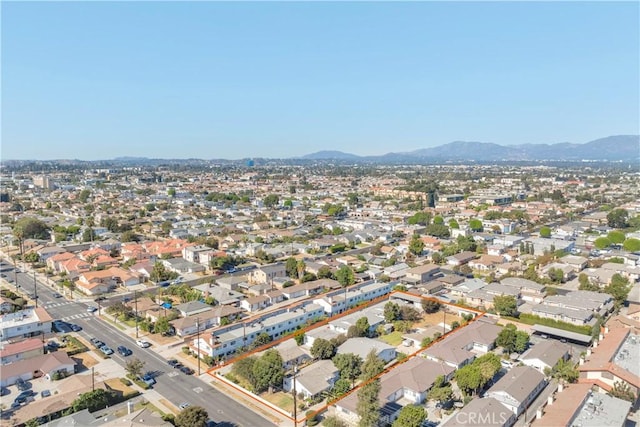 birds eye view of property featuring a mountain view