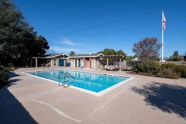 view of pool featuring a pergola and a patio