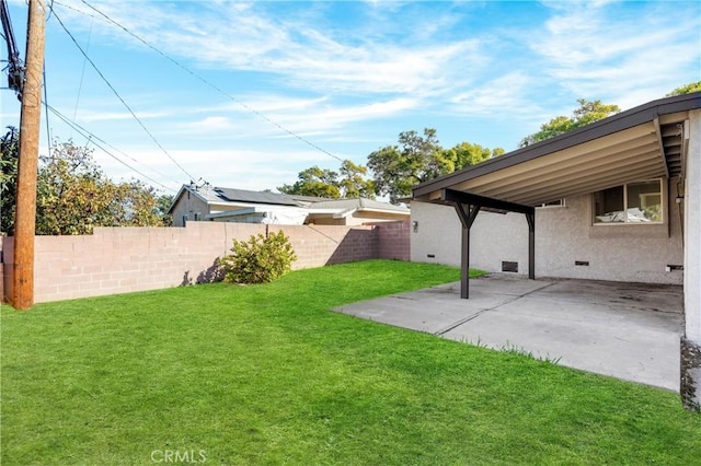 view of yard with a fenced backyard and a patio