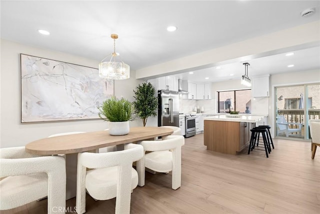 dining area featuring light hardwood / wood-style floors