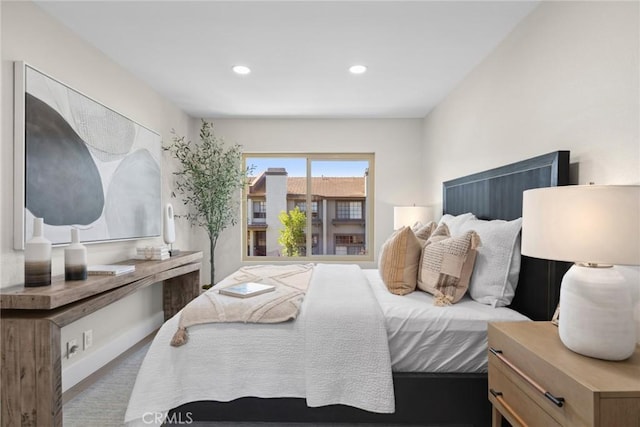 bedroom featuring dark hardwood / wood-style flooring