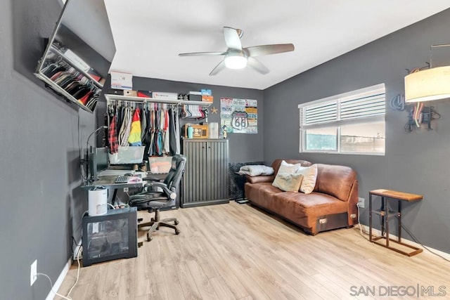 office area with ceiling fan and light wood-type flooring