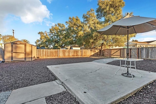 view of patio / terrace with a shed