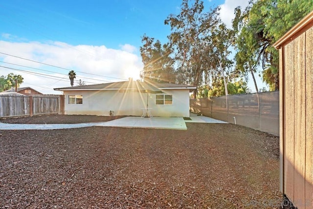 rear view of house with a patio area