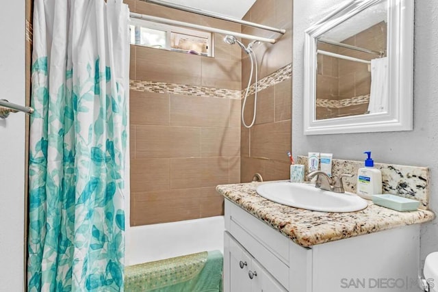 bathroom with vanity and shower / bath combo