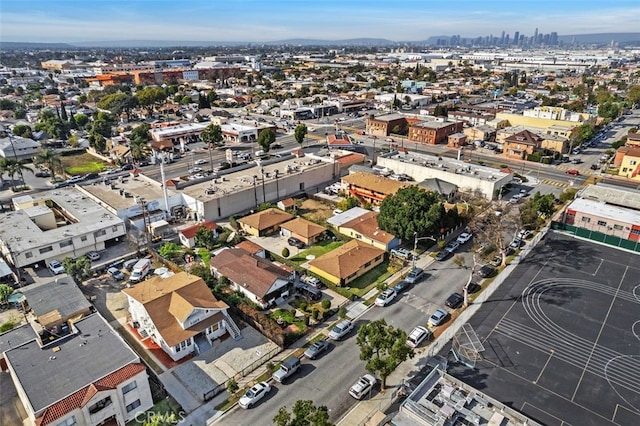 birds eye view of property featuring a city view