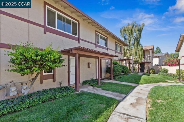 view of front of home with a front yard